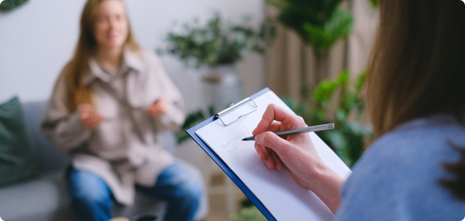 Therapist taking Progress Notes